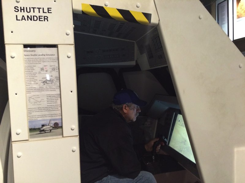 Bob attempting to land the space shuttle in a simulator